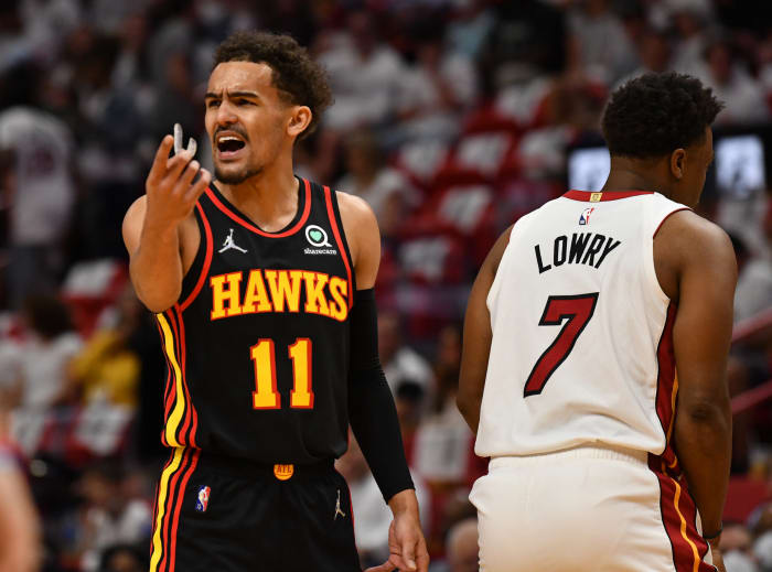 Trae Young argues a call during a game against the Miami Heat.